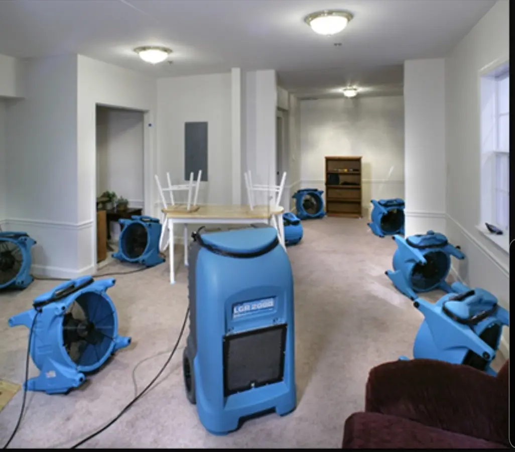 Air movers and dehumidifier setup for Water Damage Restoration in Cypress